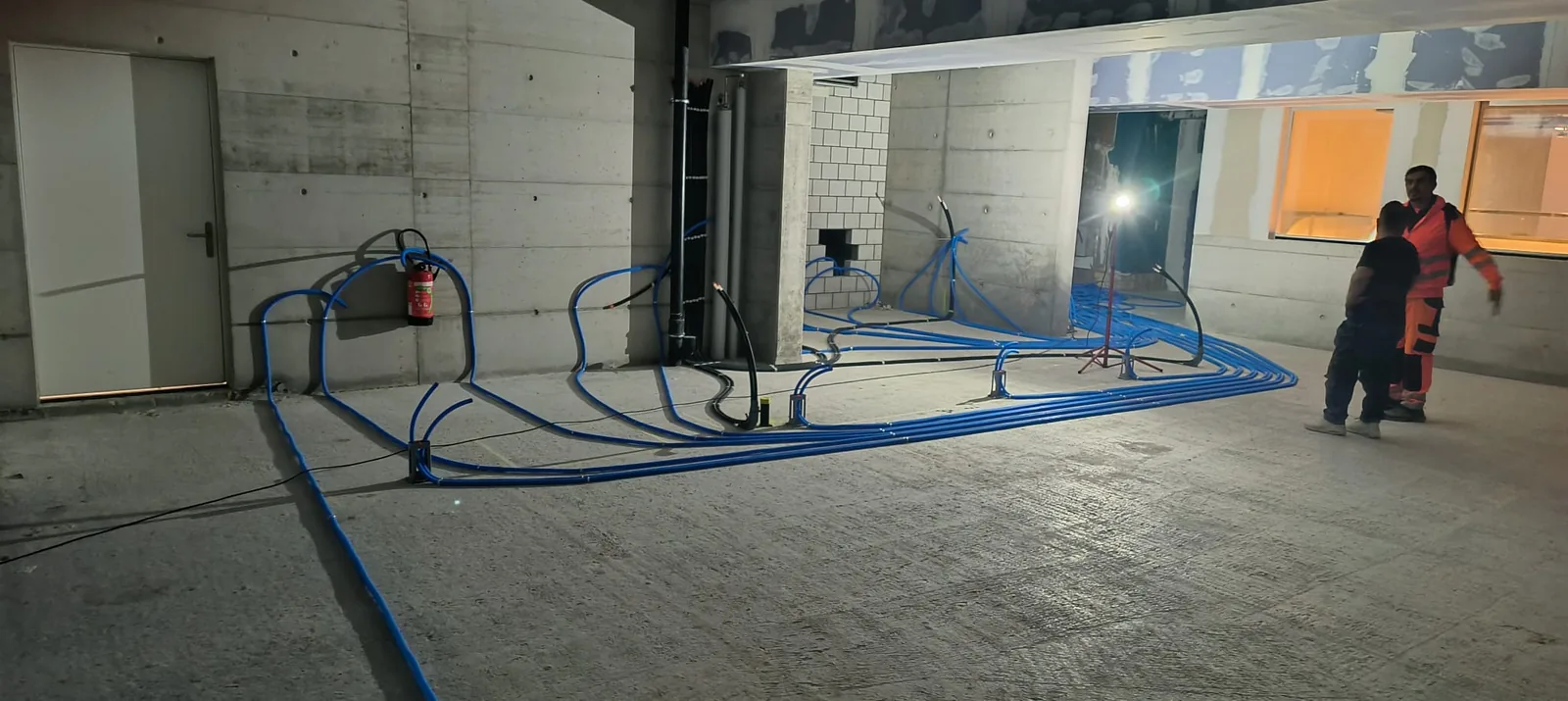 Long corridor at the new Merkurgässli location during early build phase