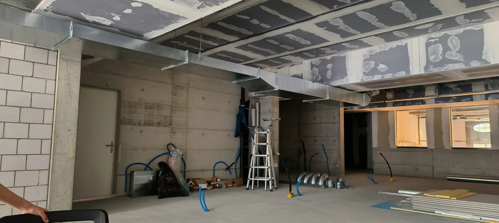 Wide view of the main game floor at Merkurgässli with the fit-out well under way