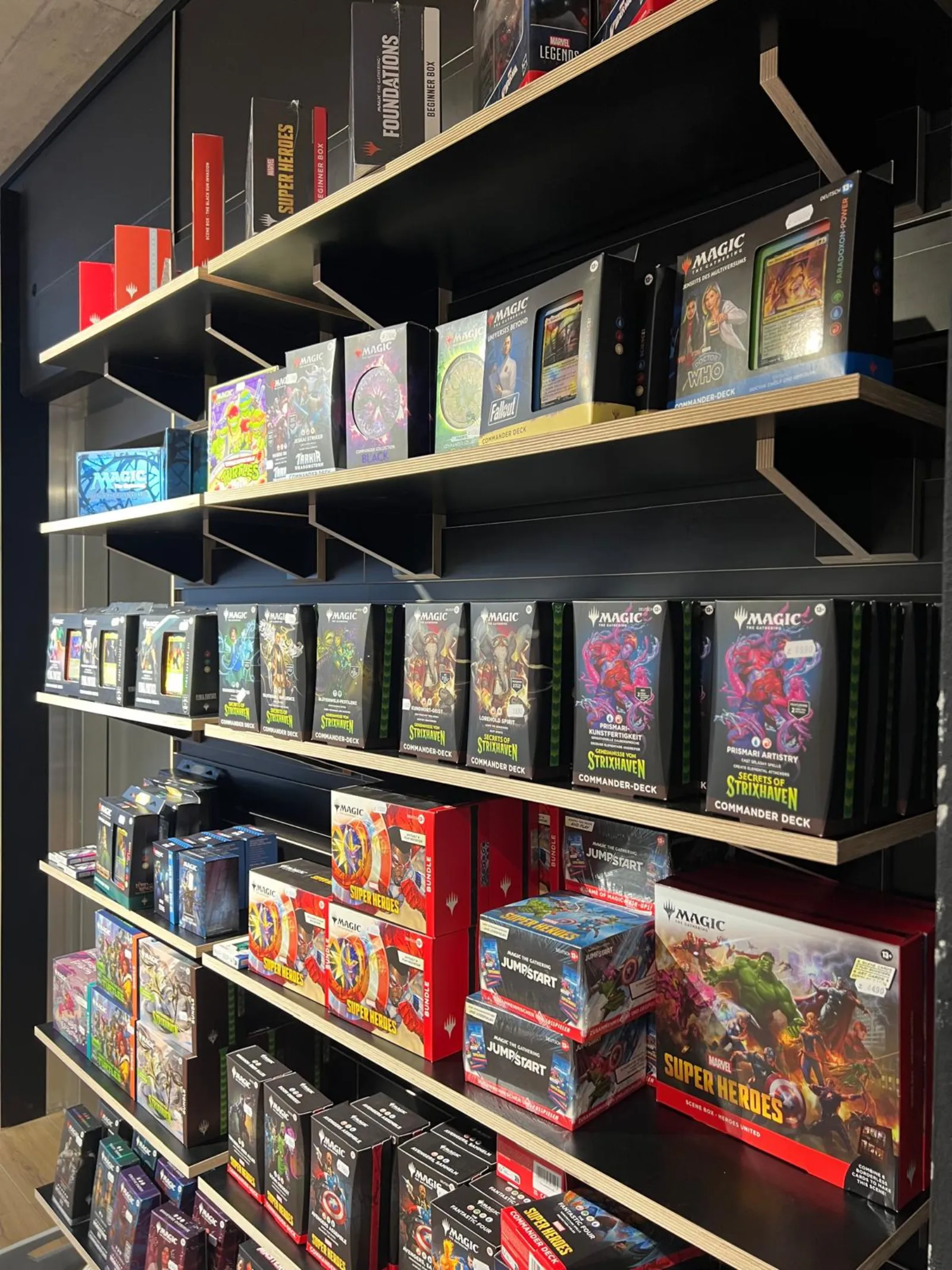 Magic: The Gathering commander decks, bundles and boxes on the shelves